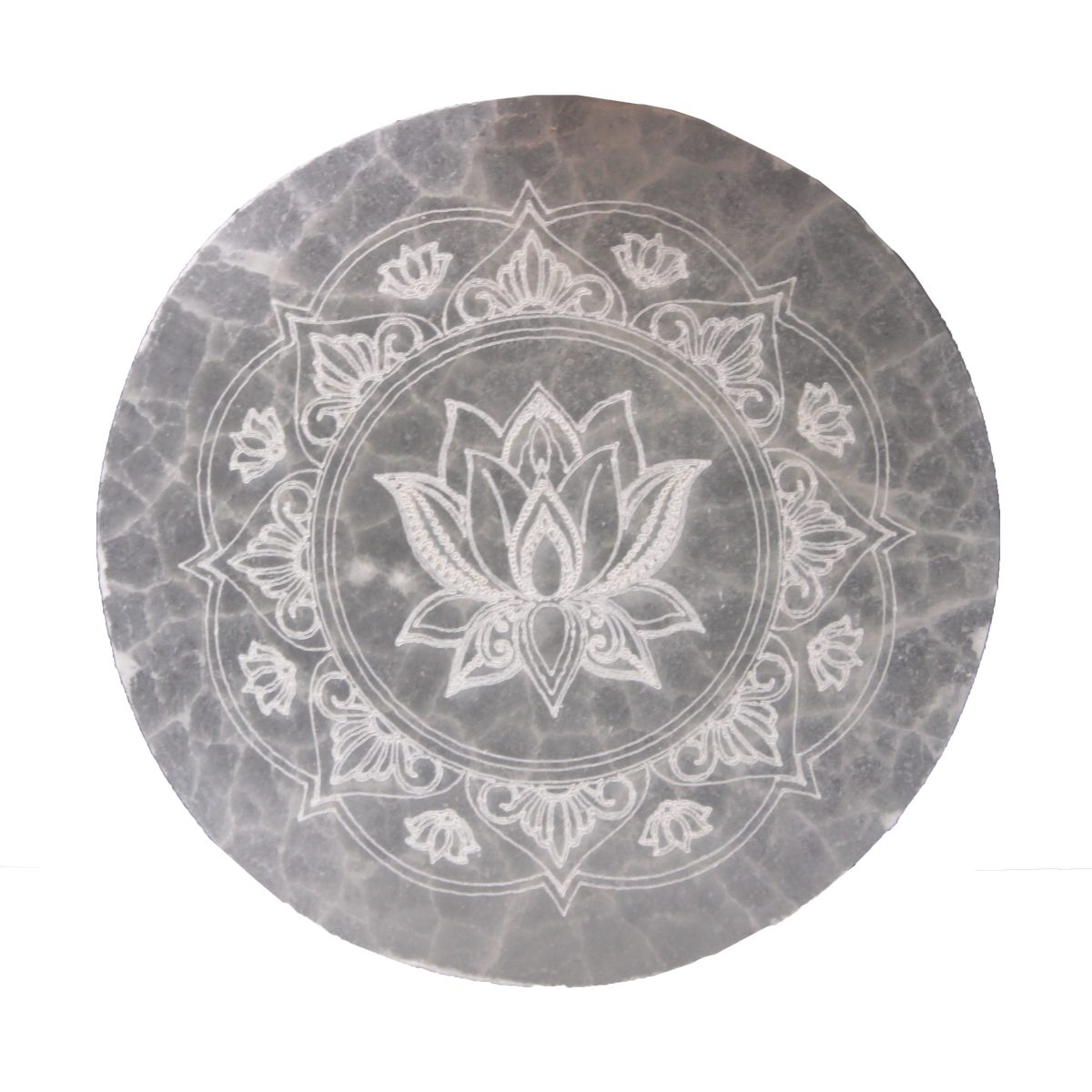 A grey stone disc displays a white lotus flower design within a circular pattern. The flower is centered inside surrounding lotus and swirl motifs.