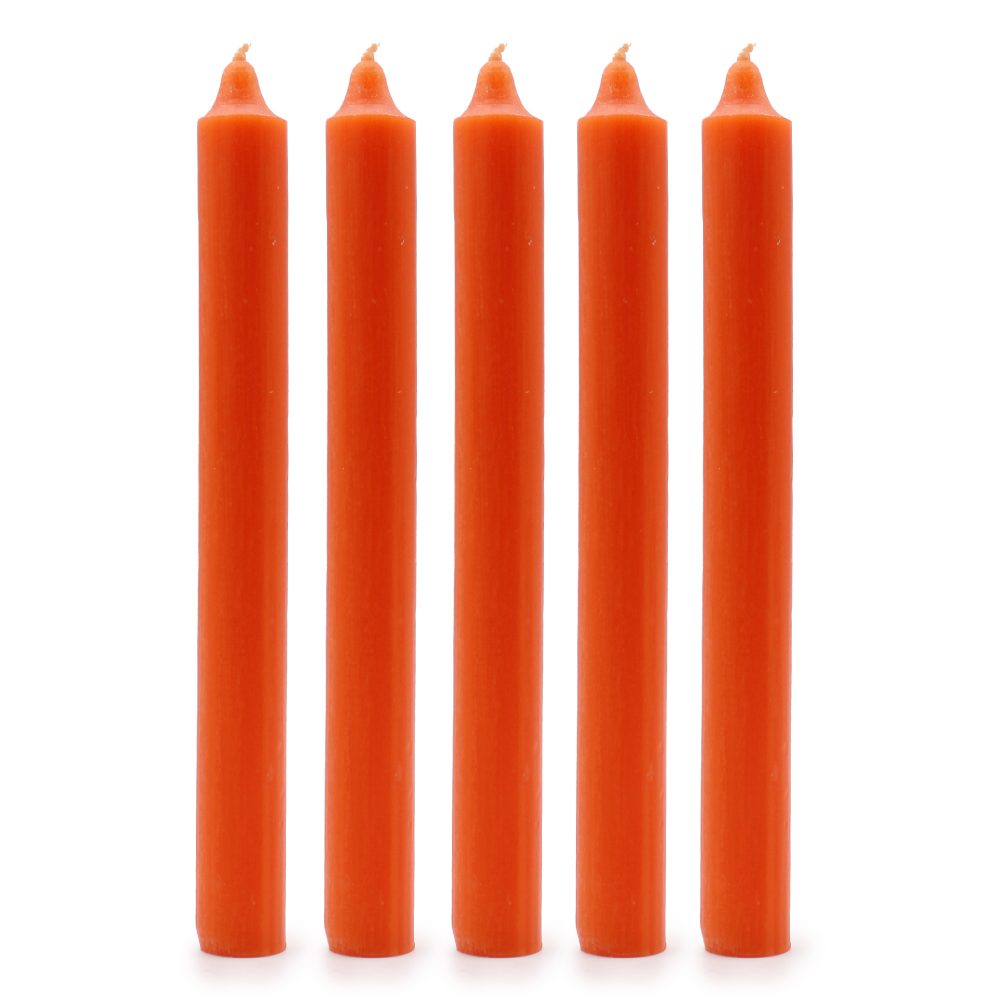 Five, unlit, orange candles stand upright in a row, side-by-side. The background is plain white.