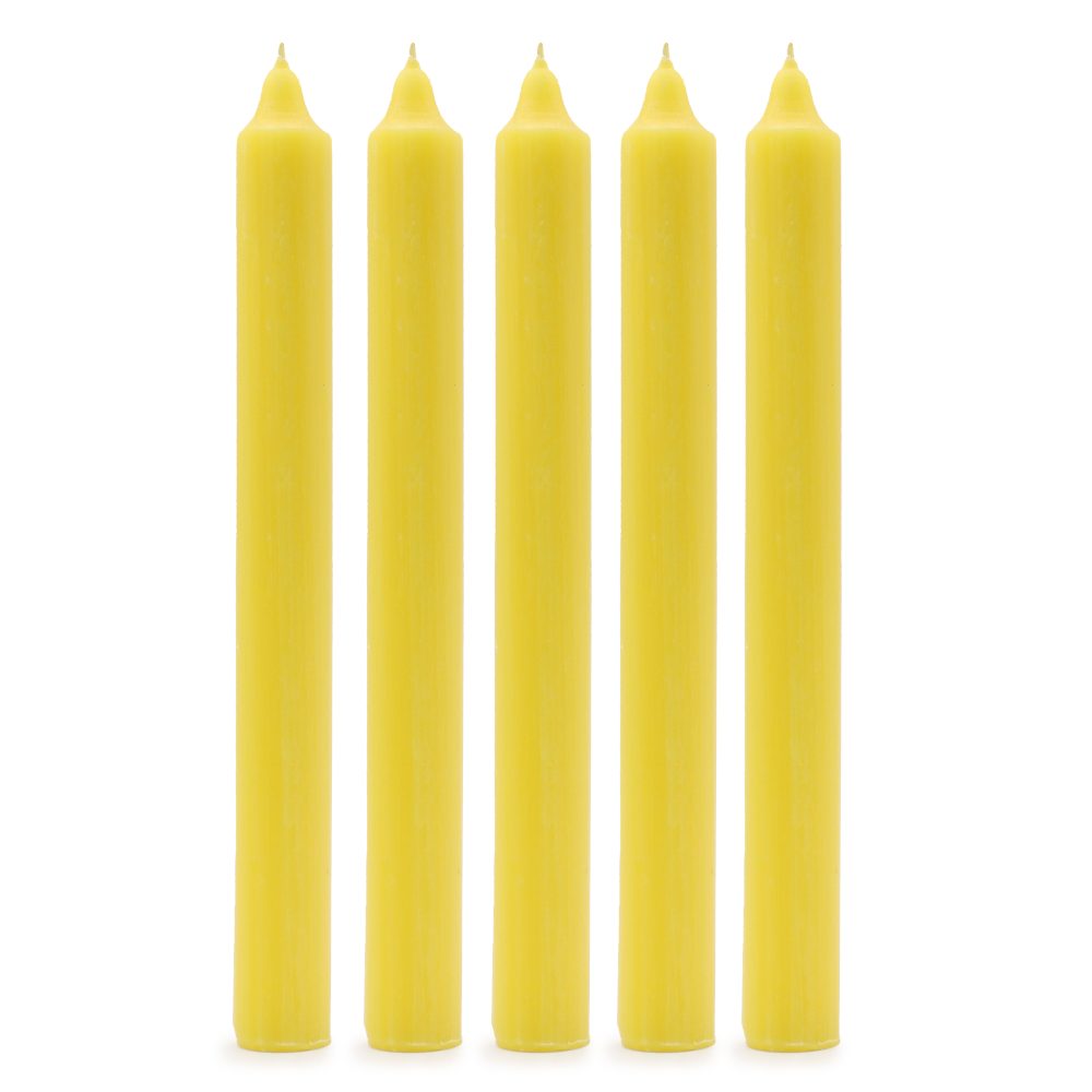 Five yellow, unlit candles stand upright in a row, evenly spaced, against a plain white background.