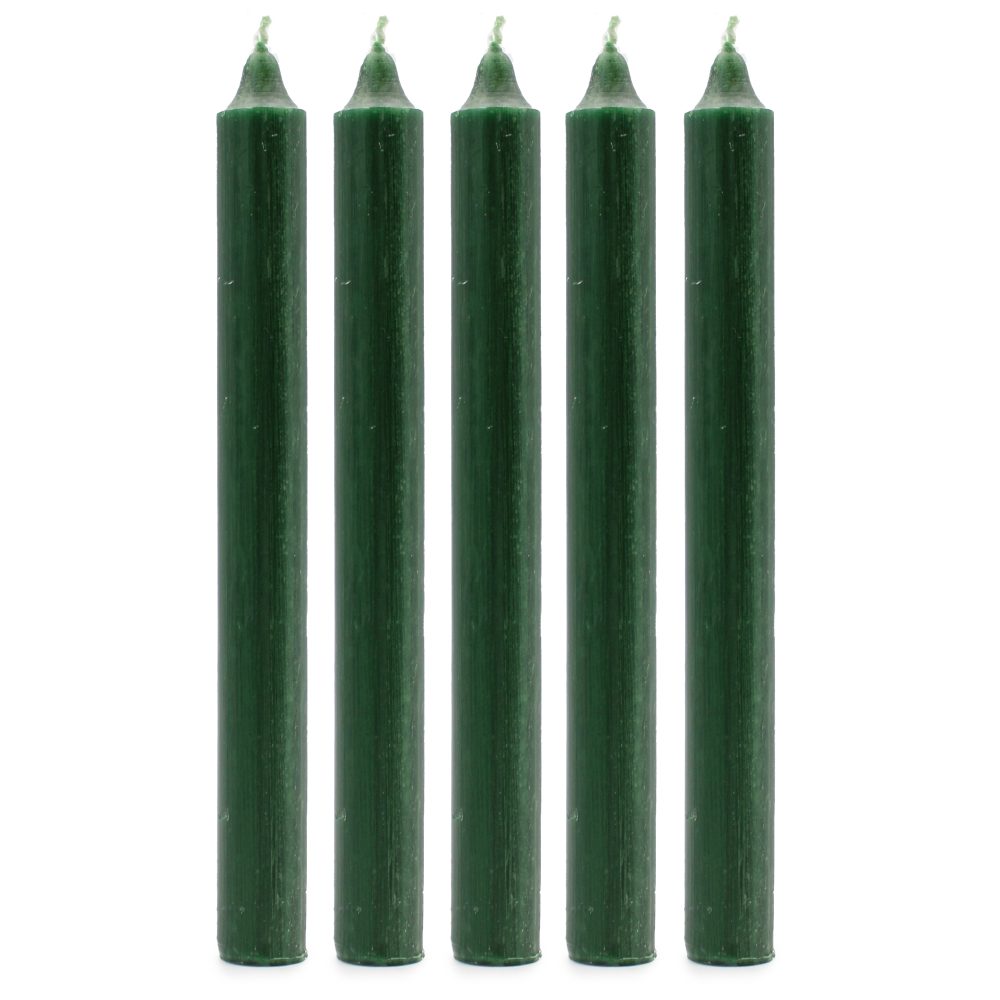 Five green taper candles stand upright, evenly spaced, against a plain white backdrop.