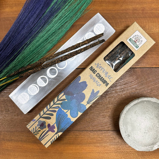Natural Botanical Masala Incense - Nag Champa handcrafted masala incense sticks in packaging, warm and earthy scent.