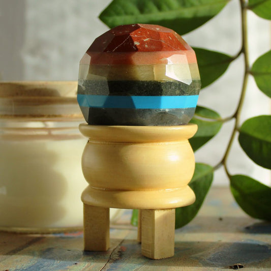 Seven Chakra faceted healing ball crystal sphere on wooden stand multicolour gemstone display