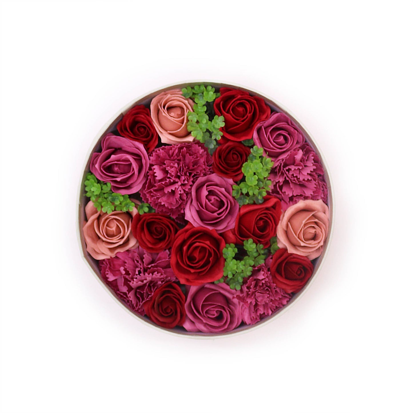 Roses and carnations, arranged in a circular box, are displayed against a white background.