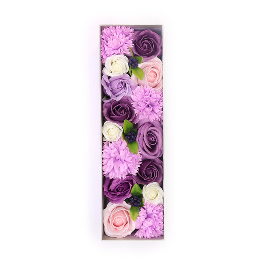 Roses and carnations, arranged to form the letter “I,” are contained within a rectangular box set against a white background.