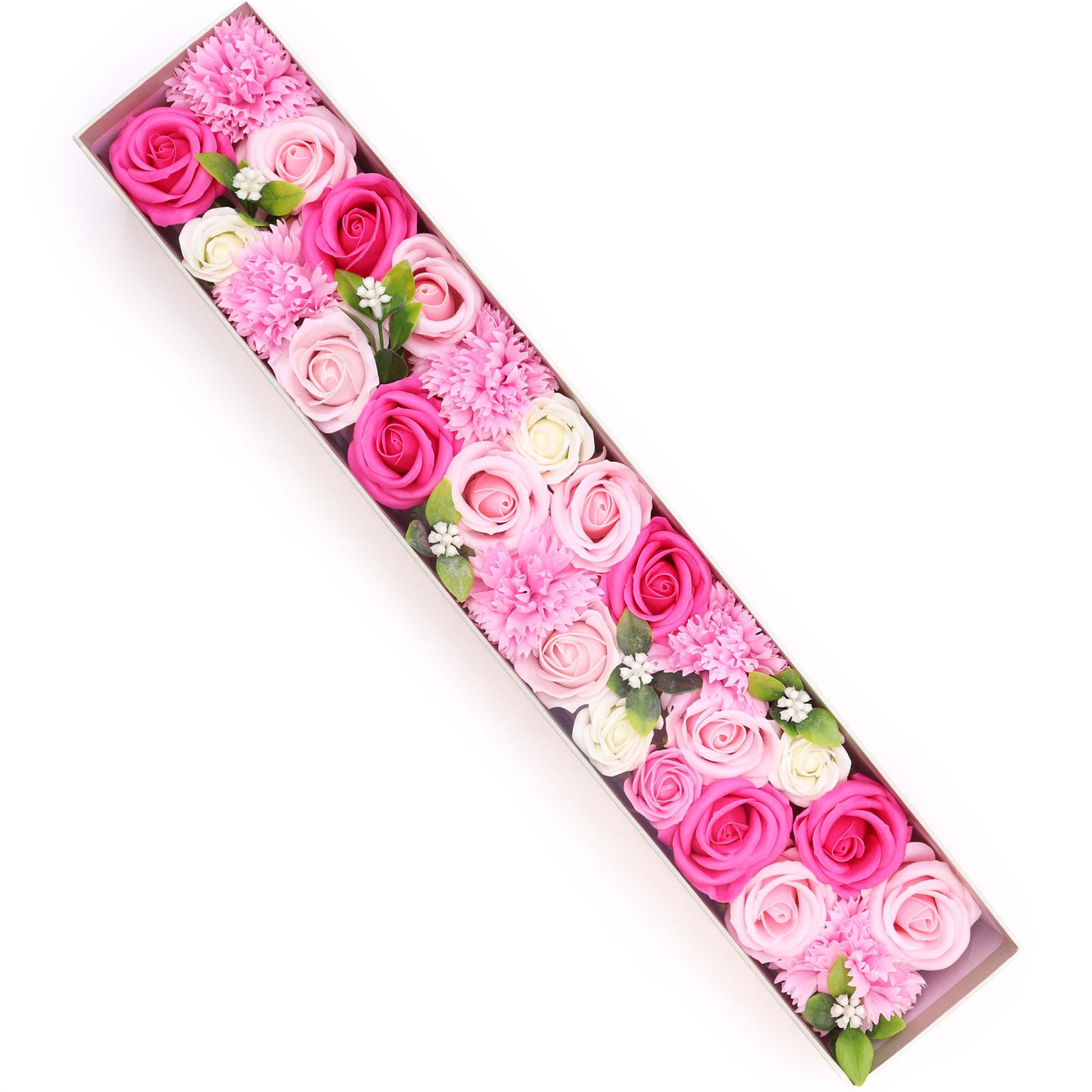 A long rectangular box holds pink and white roses and carnations arranged in a linear pattern.  The flowers are tightly packed, creating a vibrant floral display against a white background.
