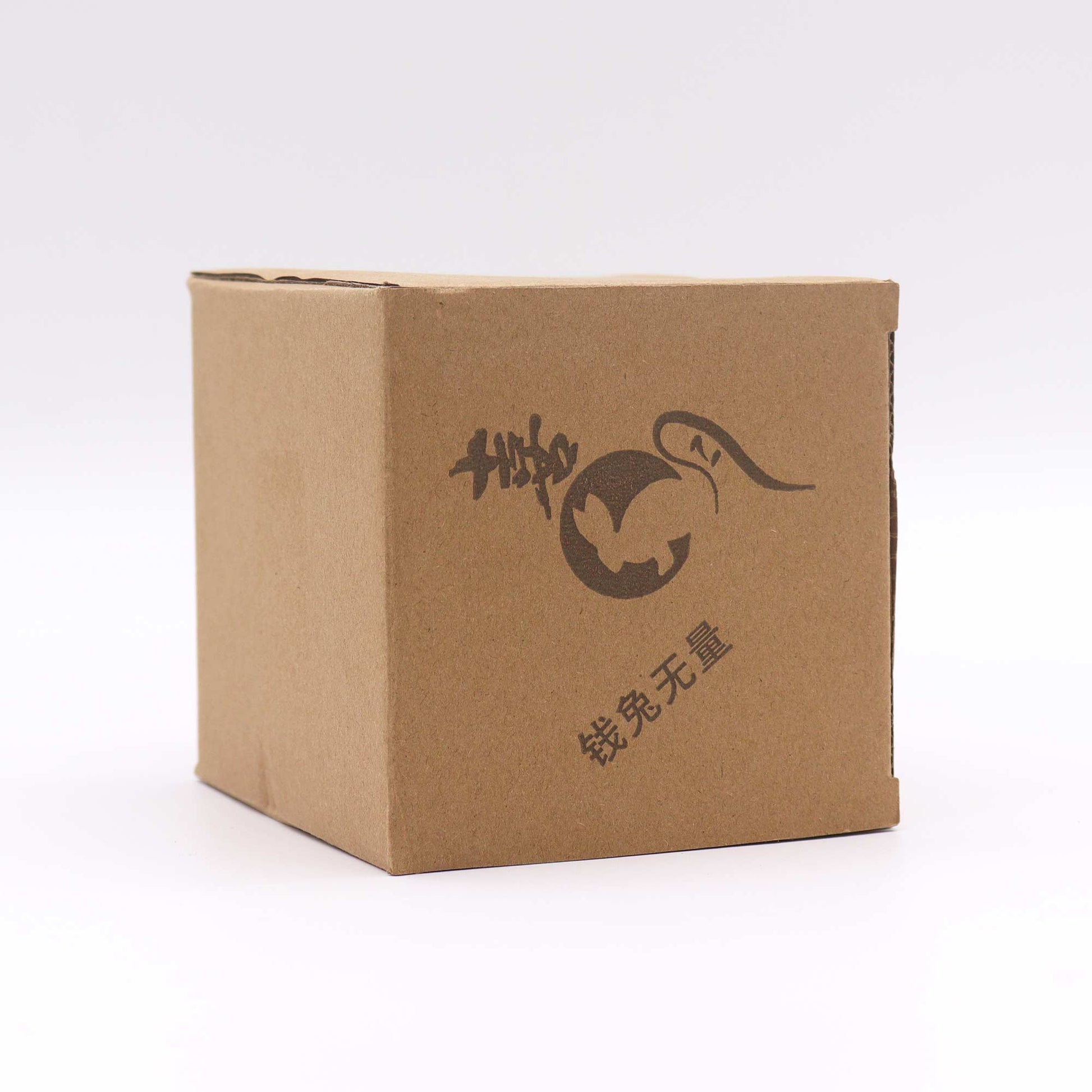 A brown cardboard box sits on a white background.  The box features a logo that includes stylized text and graphics.  The text reads:  烘焙  铁锈无趣.