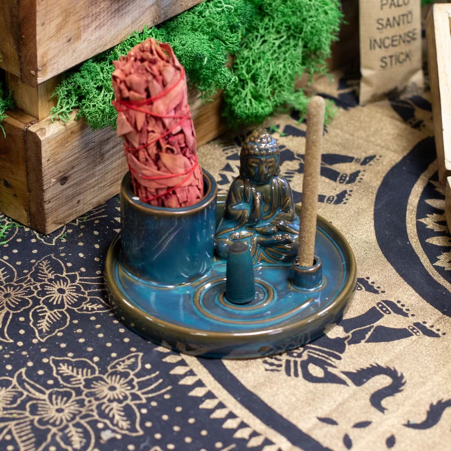 Blue glazed ceramic Buddha incense plate with seated Buddha and holders for incense sticks and cones