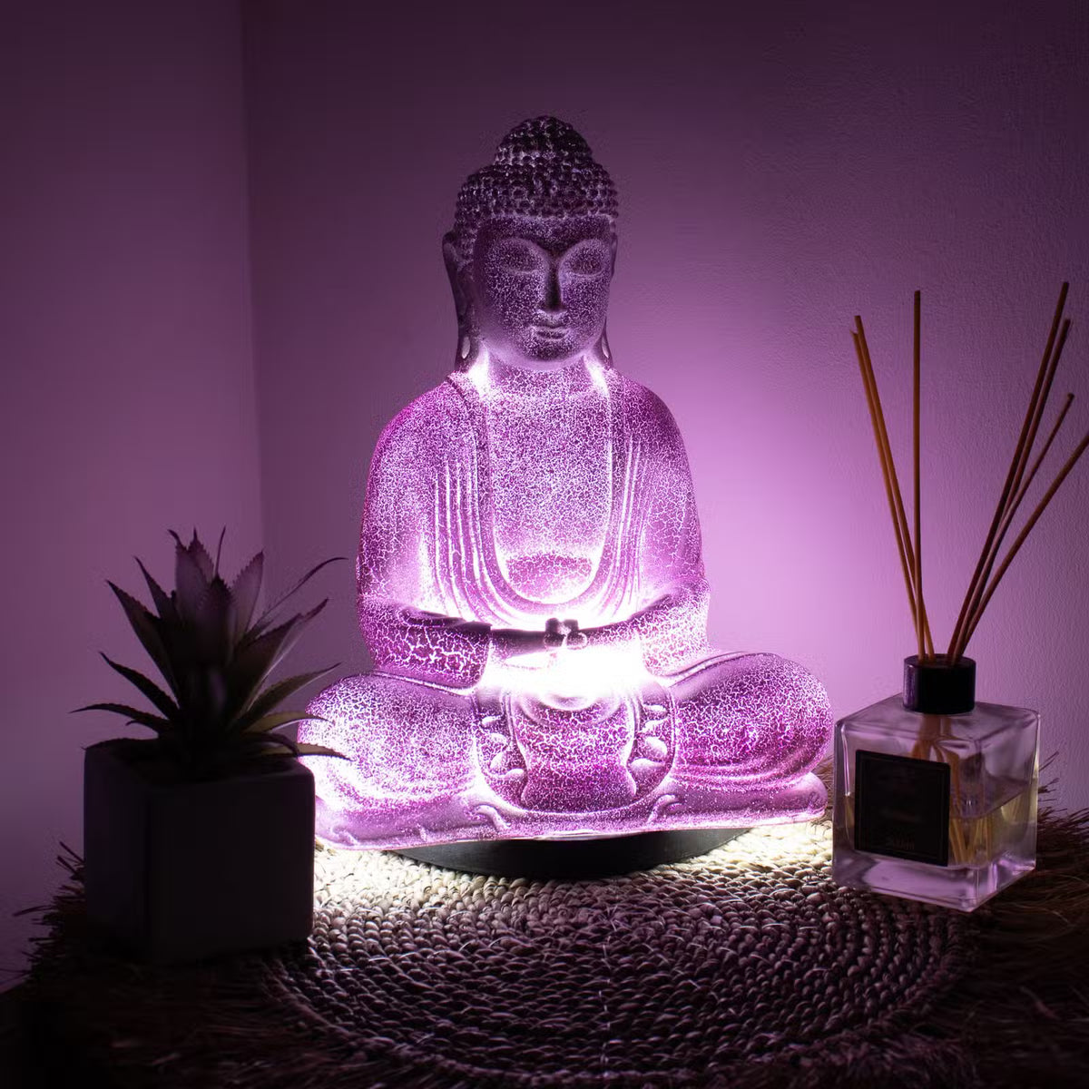 Lavender Meditation Buddha lamp with soft purple crackle glow and black oval stand UK