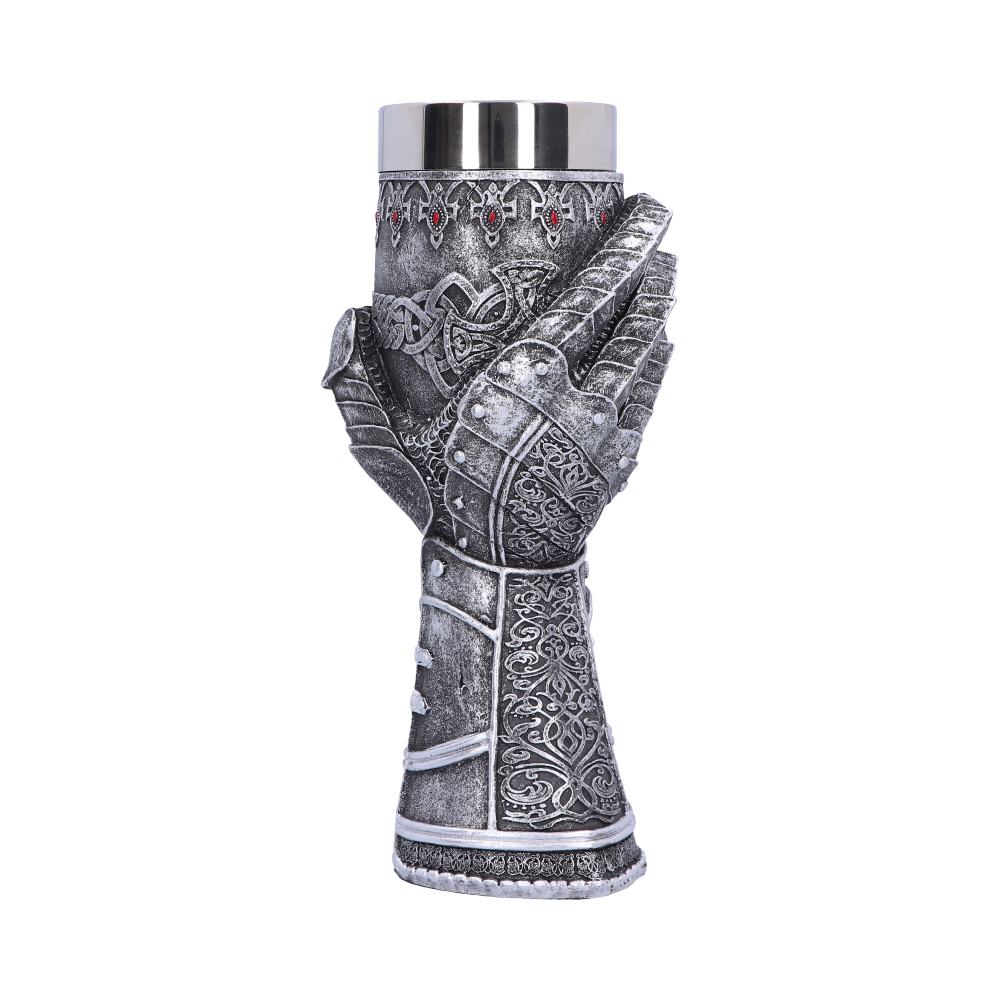A metal drinking mug is being held by an ornate, armored gauntlet that forms the base. The background is white.