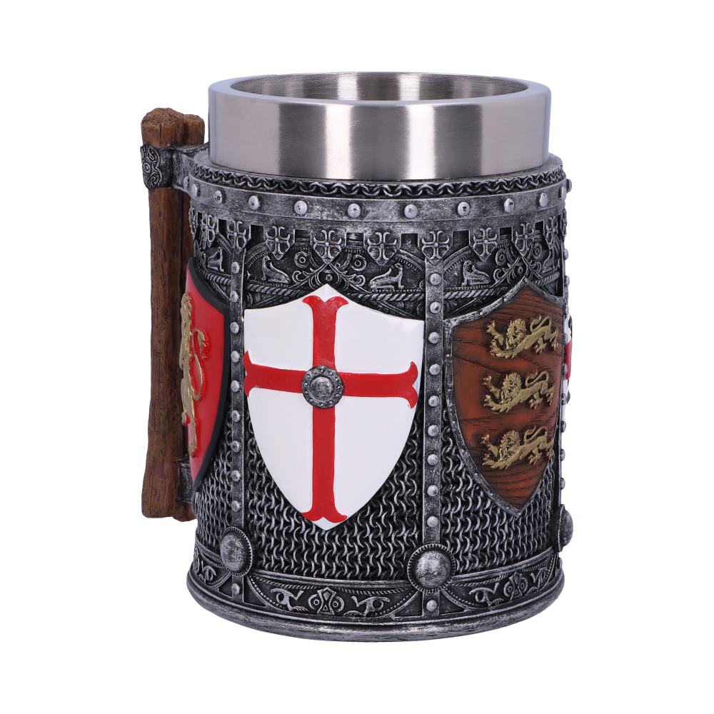 A steel mug, styled after knight's armor, displays three shields: one red and gold, one white with a red cross, and one brown with three gold lions. The mug has a wood-like handle.