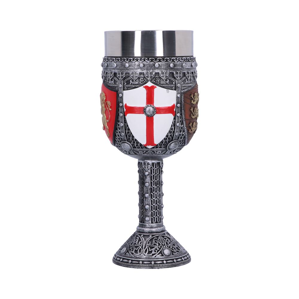 A decorative silver-colored goblet featuring a red cross on a white shield is centered. The goblet is on a white background.