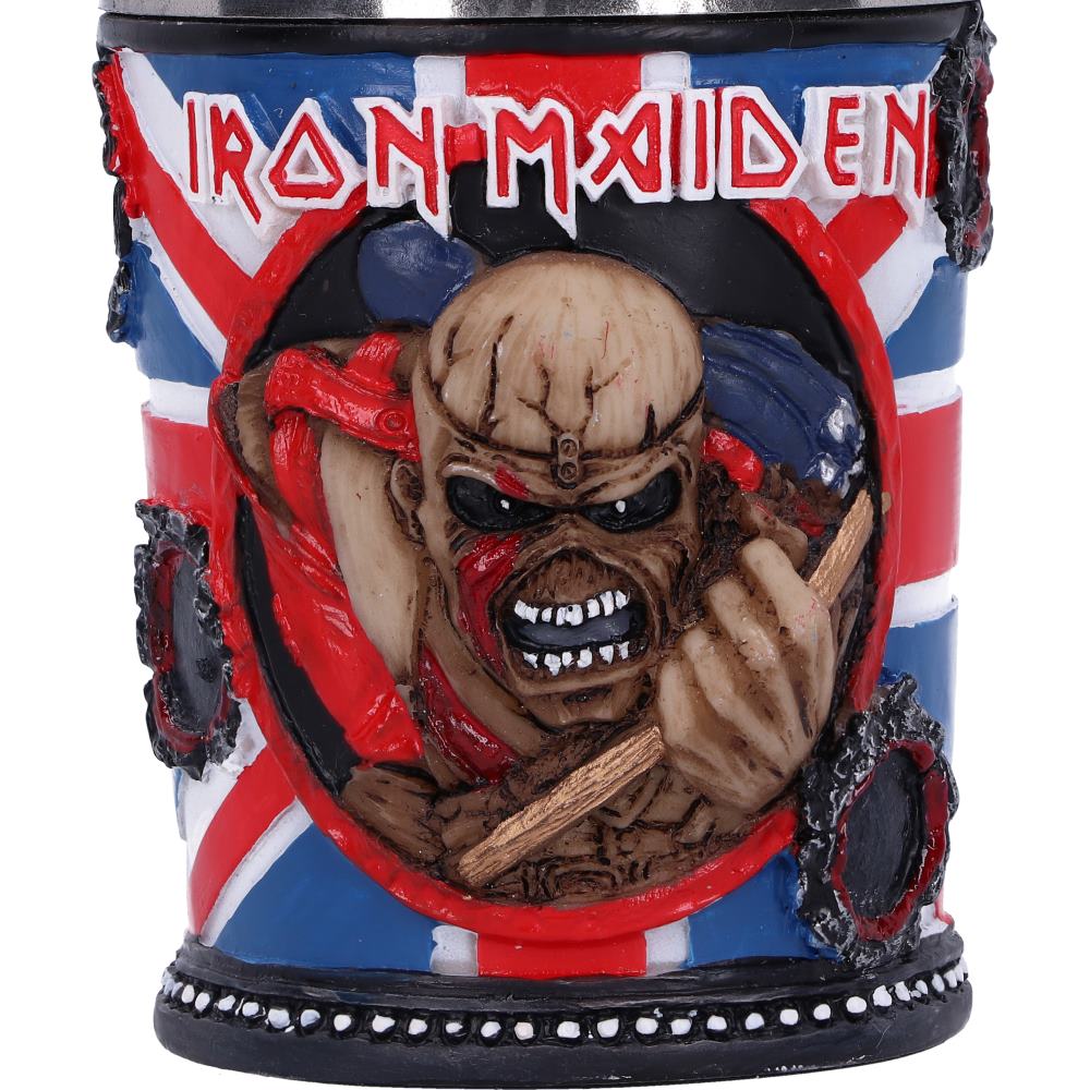 A detailed, sculpted tankard features a menacing figure holding a wooden weapon. Red and blue Union Jack colors surround the character. "IRON MAIDEN" is embossed in bold letters at the top.