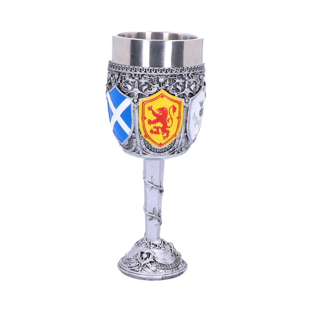 The silver chalice has shield designs, including St. Andrews Cross and a gold lion. It stands on a decorative base in a white space. Text: ONEMESIS NOW