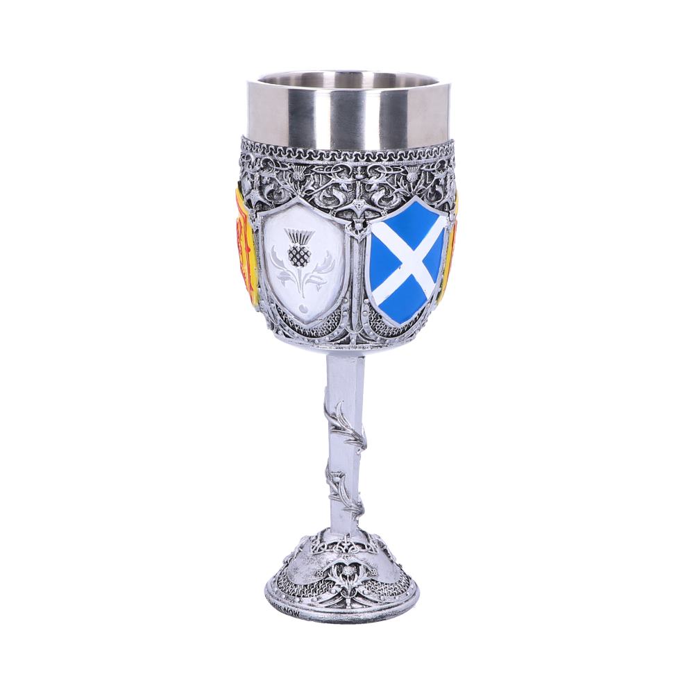 A silver chalice stands, displaying thistle and saltire shield designs. The background is plain white.