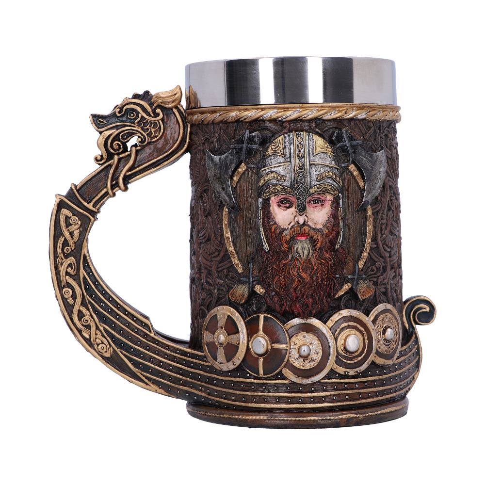 The Viking mug features an embossed warrior portrait with axes, shields, and a longboat handle, all carved in a bronze-like texture with a metallic cup insert.