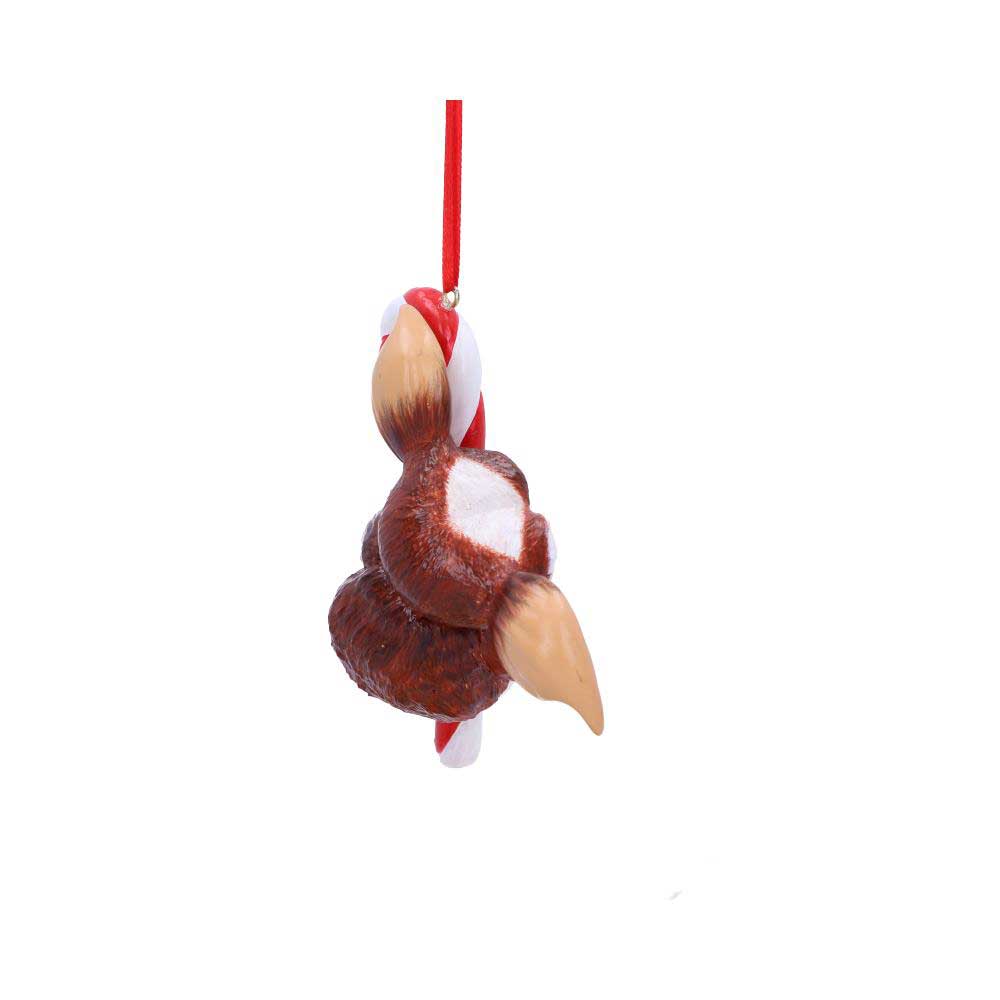 A brown bird ornament hangs from a red string, portraying a Santa hat and wrapped around a red-and-white candy cane, isolated against a plain white background.