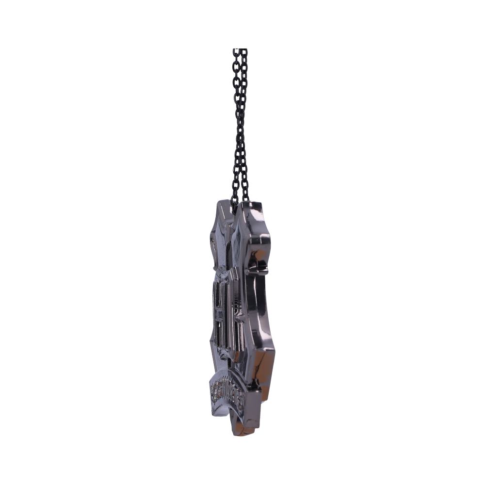 A silver, star-shaped metallic pendant hangs vertically on a black chain, displayed against a plain white background. The pendant features engraved details and a three-dimensional design.