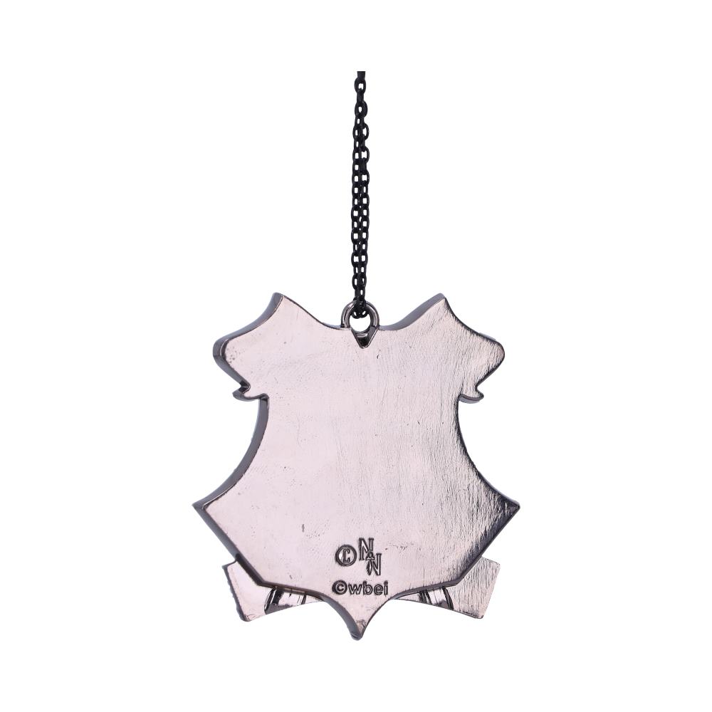 Thin metal emblem hanging from a chain, shaped like a shield. It's engraved with text: "ON," "N," "ON bei." The background is plain white, emphasizing the emblem.