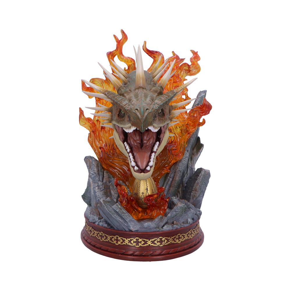 Front view of the Harry Potter Horntail’s open jaws above fire and a golden egg