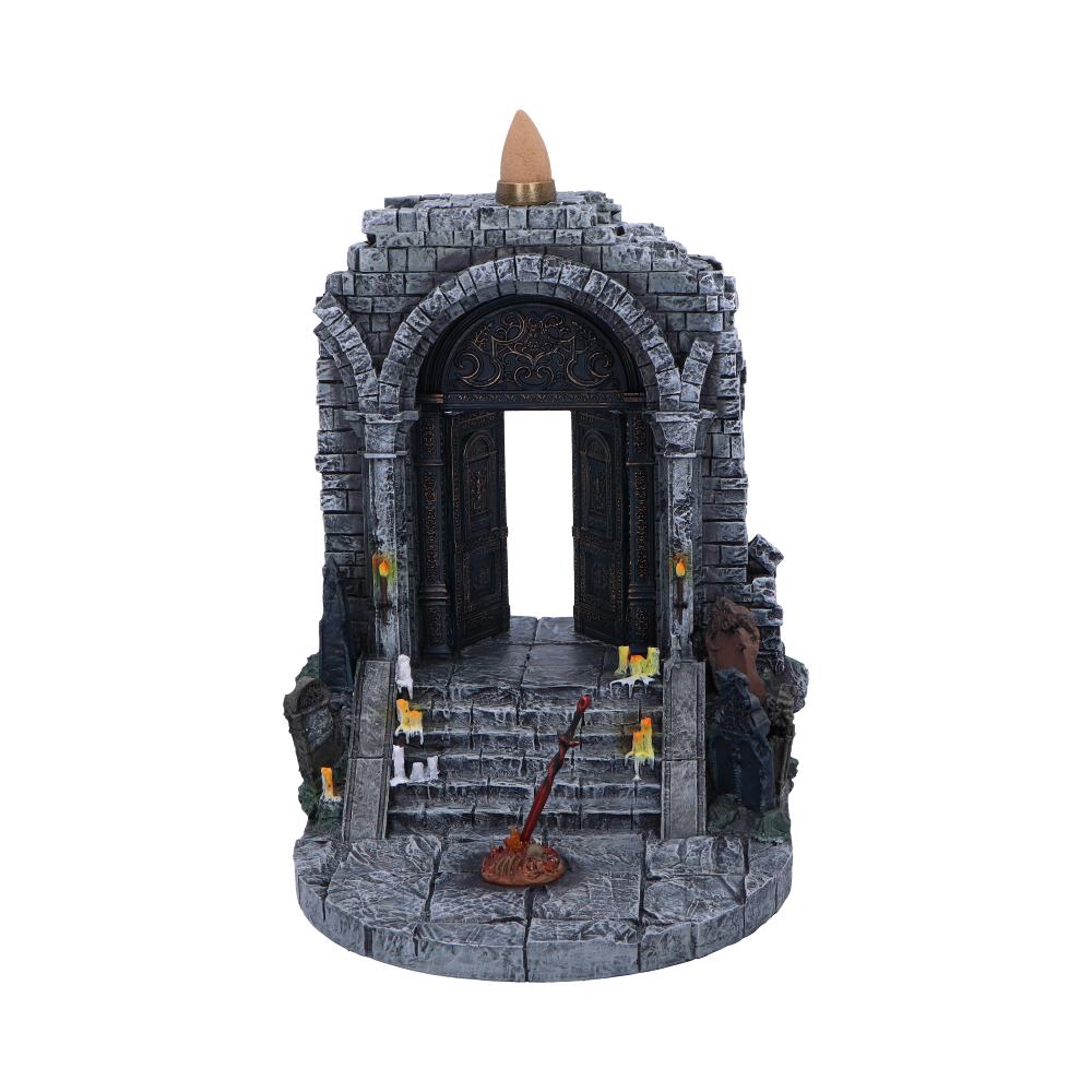 Front angle of Fog Gate burner with candles and a sword on the steps