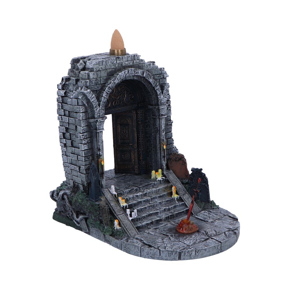 Side view of the stone arch burner showing its steps and rocky surround