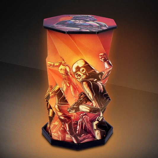 Hexagonal decorative lamp glows with orange light, showcasing illustrated futuristic armored soldiers holding rifles in dynamic poses on faceted panels atop a dark tabletop with a gradient background.