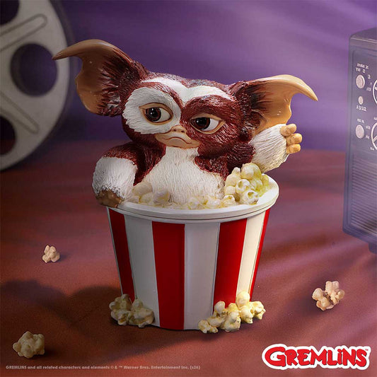 Gremlins Gizmo Feast Box - displayed in a cinema-themed setting beside scattered popcorn props