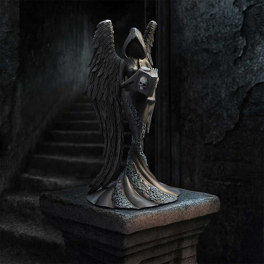 Femme Fatale Scholar Gothic Figurine - displayed in a dark architectural setting with the book held close