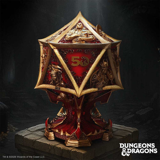 Dungeons & Dragons 50th Anniversary Box - displayed on a dark surface with the raised gold artwork facing forward