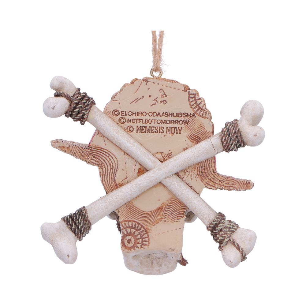 Rear of the straw-hat skull ornament showing crossed bones and hanging loop