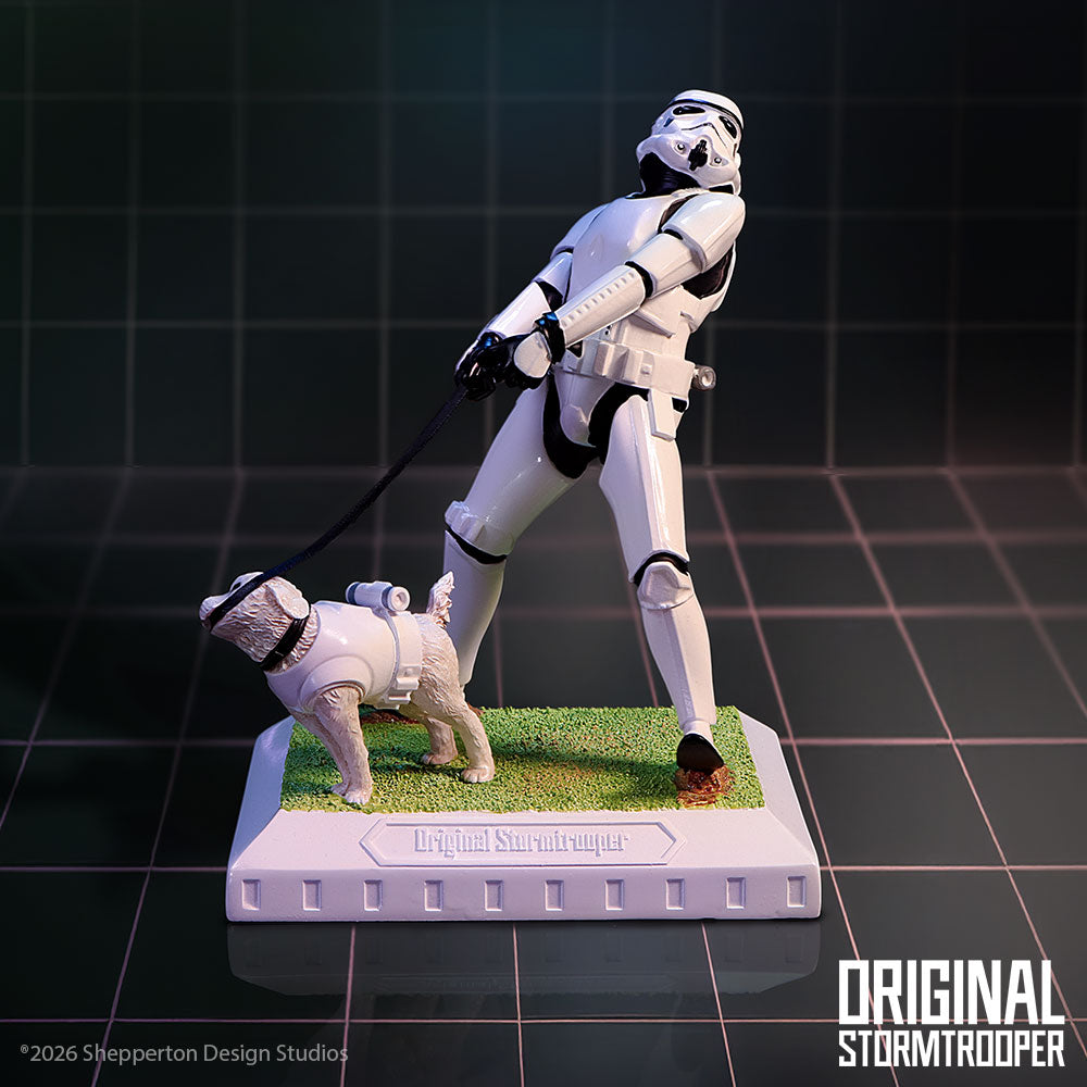 Stormtrooper and armoured dog figurine on a dark gridded studio background