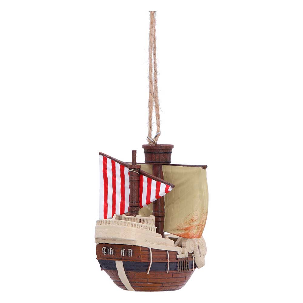 Rear angle of the ship ornament showing its striped sail and hull