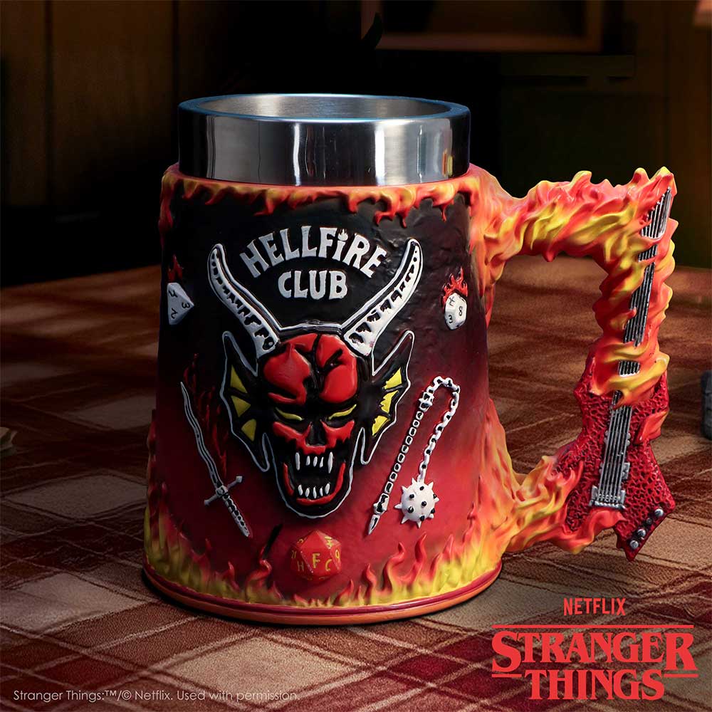 Stranger Things Hellfire Club Tankard - displayed in a dark interior with the Hellfire Club artwork facing forward