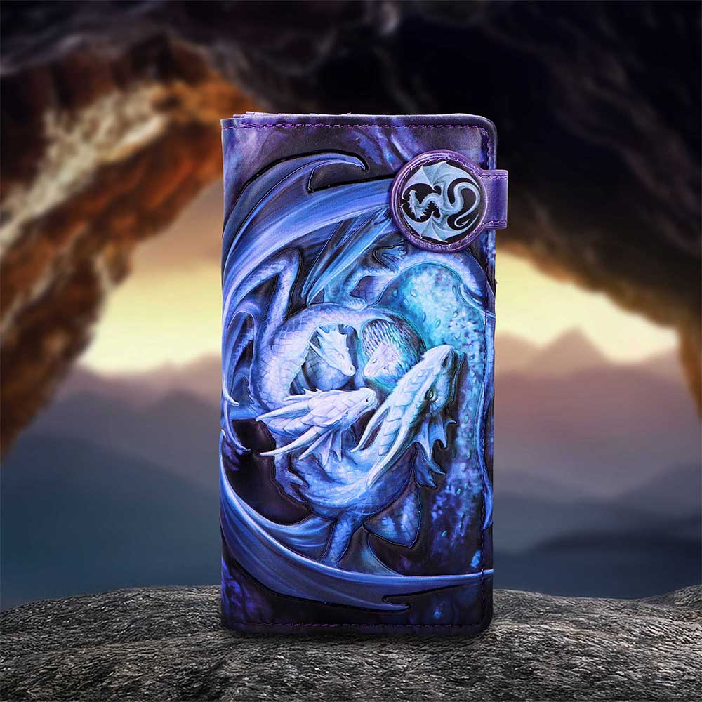 Anne Stokes Welcome Hatchling Embossed Purse - displayed against a fantasy cave backdrop with the blue hatchlings visible