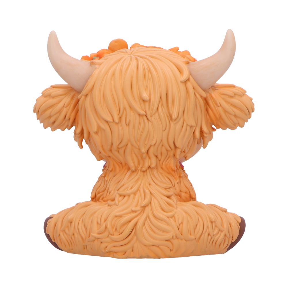 Moo Crew Marigold Flower Cow Figurine - rear showing sculpted orange fur around the seated body
