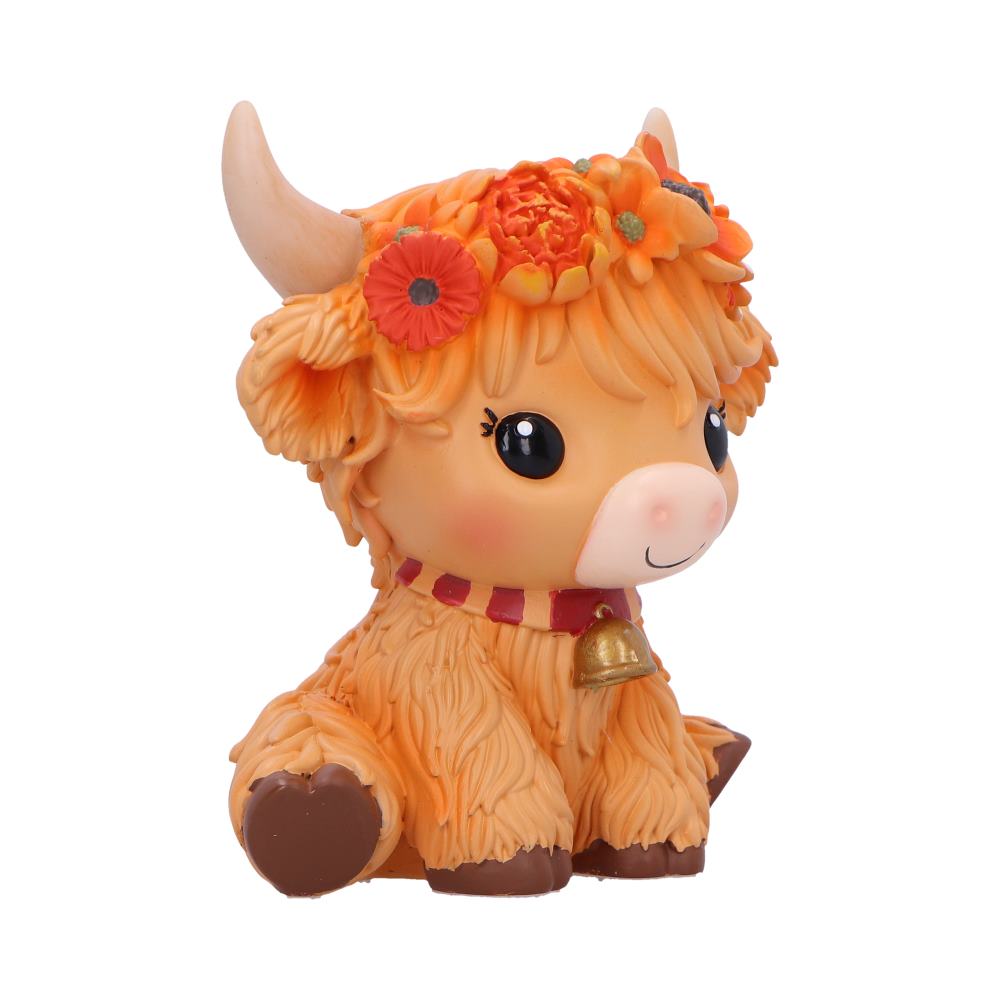 Moo Crew Marigold Flower Cow Figurine - opposite angle with curved horns and colourful flowers above the fringe