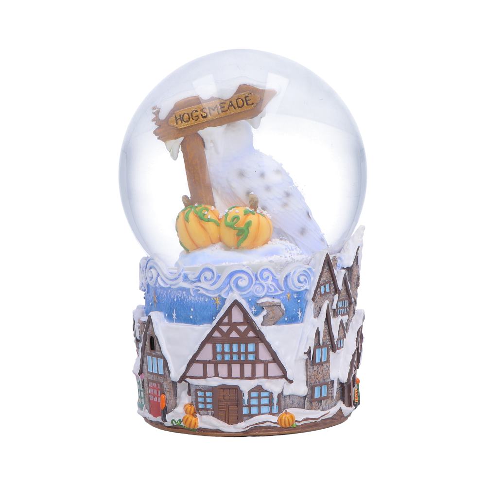 Harry Potter Hogsmeade Village Snow Globe - reverse with the Hogsmeade sign and a large timbered house below