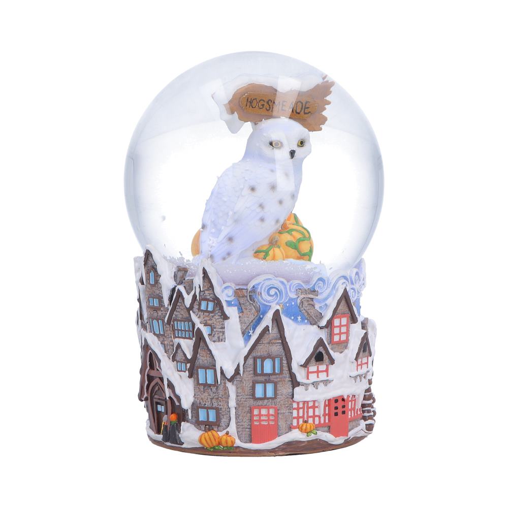 Harry Potter Hogsmeade Village Snow Globe - opposite angle showing Hedwig and snow-covered rooftops