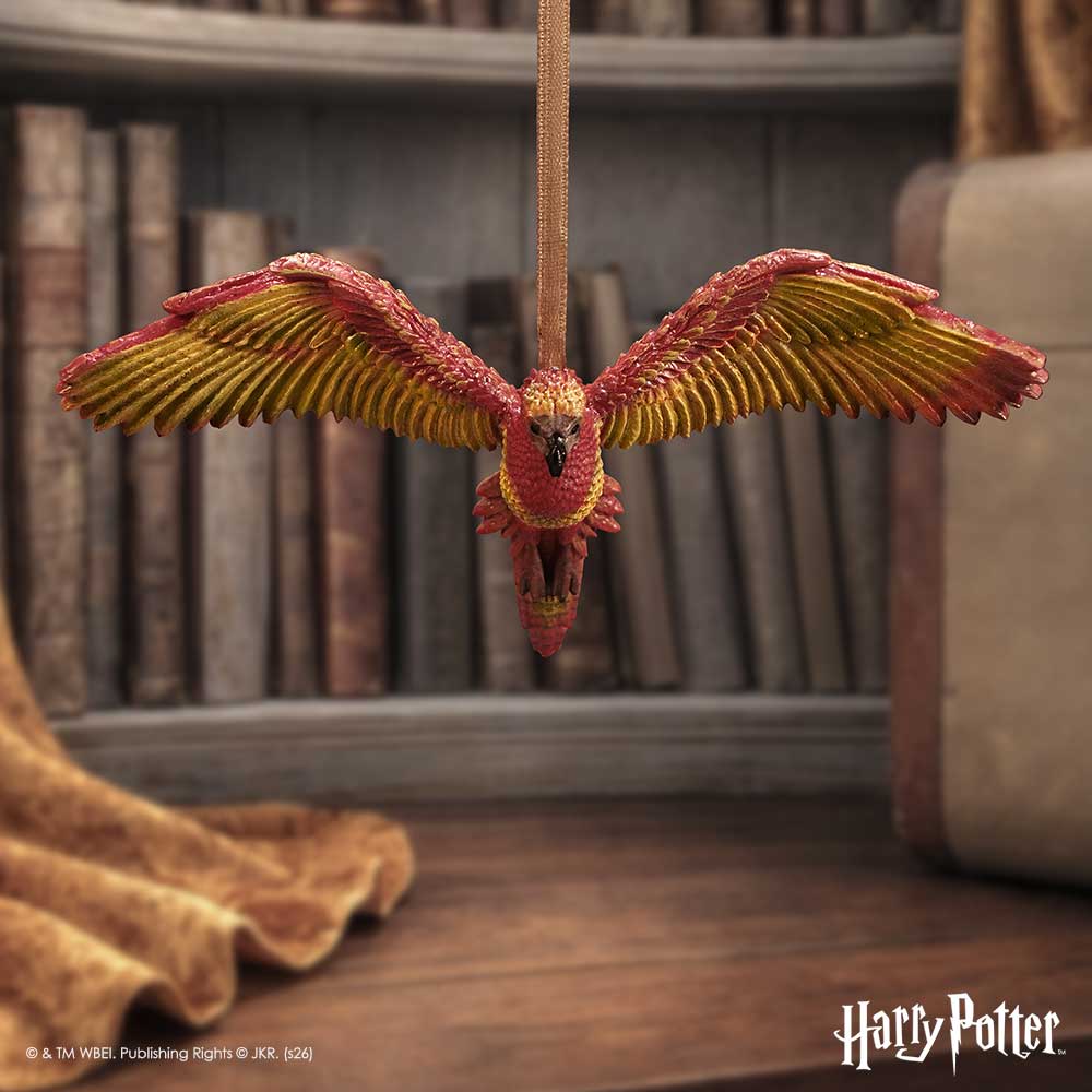 Harry Potter Fawkes in Flight Hanging Ornament - Fawkes hanging in a styled wizarding display