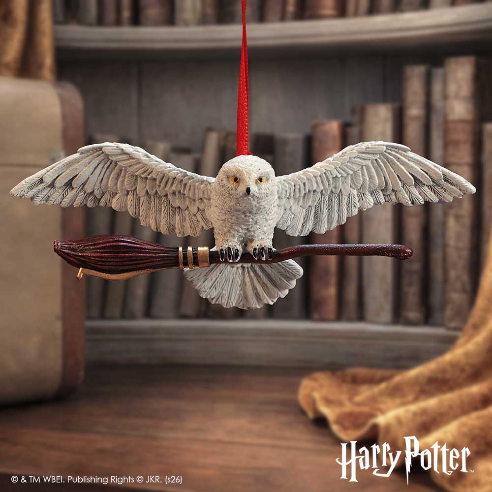 Harry Potter Hedwig in Flight Hanging Ornament - Hedwig hanging in a styled Harry Potter display