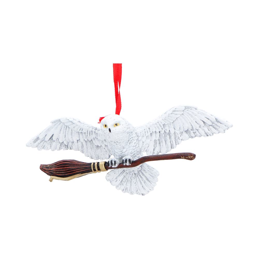 Harry Potter Hedwig in Flight Hanging Ornament - Front showing snowy owl holding a brown broom