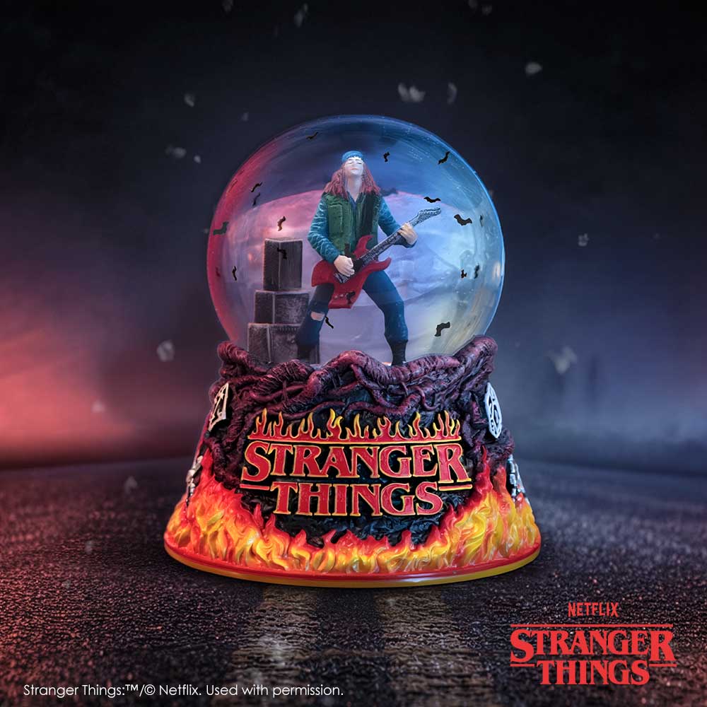 Stranger Things Eddie’s Sacrifice Snow Globe - Eddie snow globe in a styled Stranger Things setting