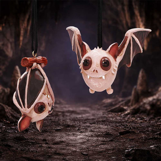 Sneak and Peak set of two light-purple bat hanging ornaments by Nemesis Now, with brown eyes, tiny fangs and flying and upside-down poses