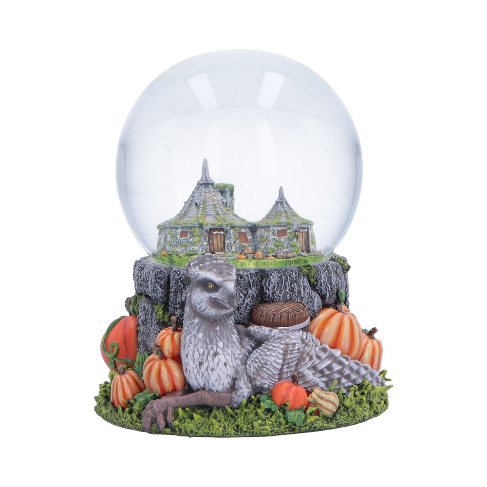 Harry Potter Hagrid’s Hut Snow Globe - Hagrid’s Hut globe above Buckbeak and pumpkins
