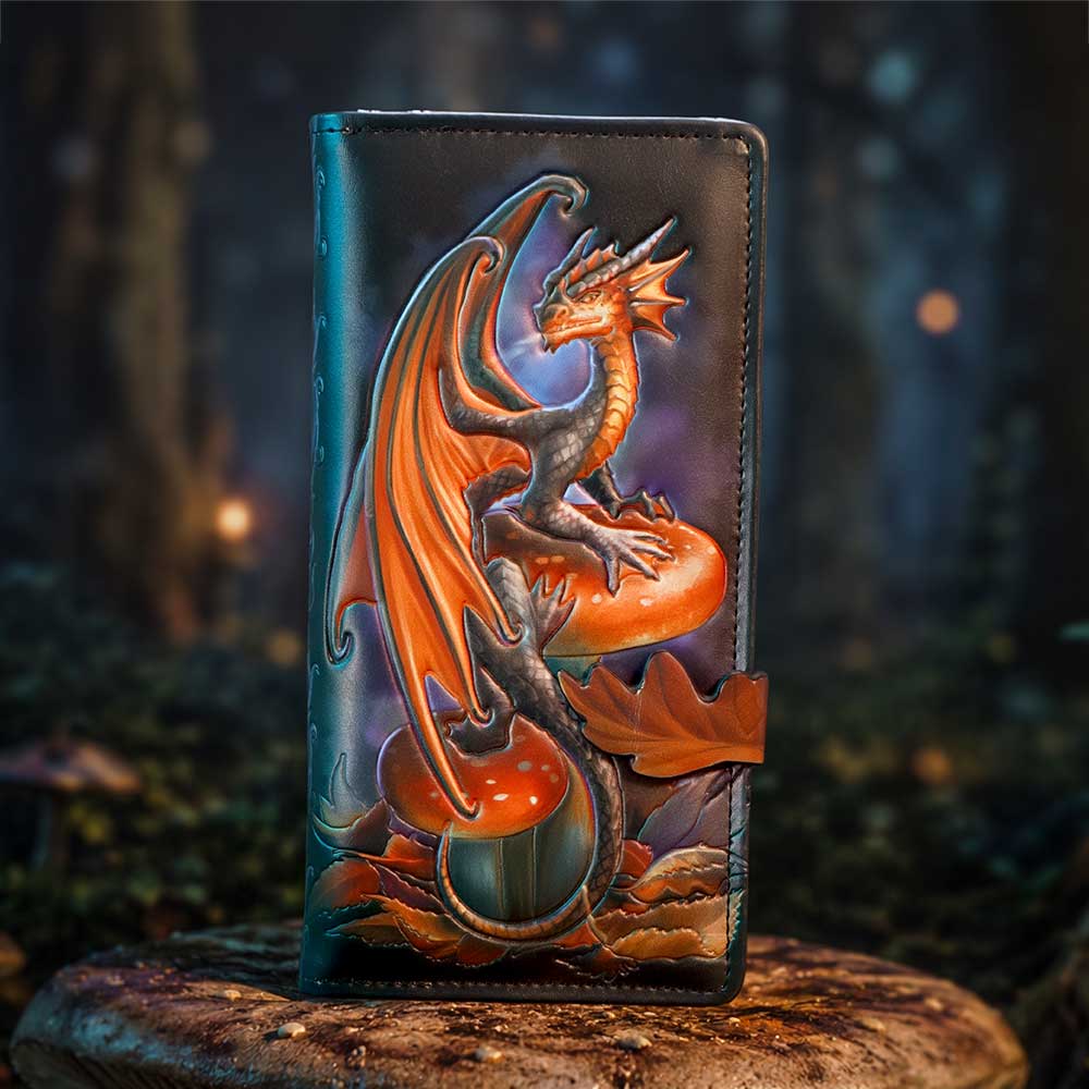 Anne Stokes Mushroom Dragon Embossed Purse - dragon purse displayed in a woodland setting