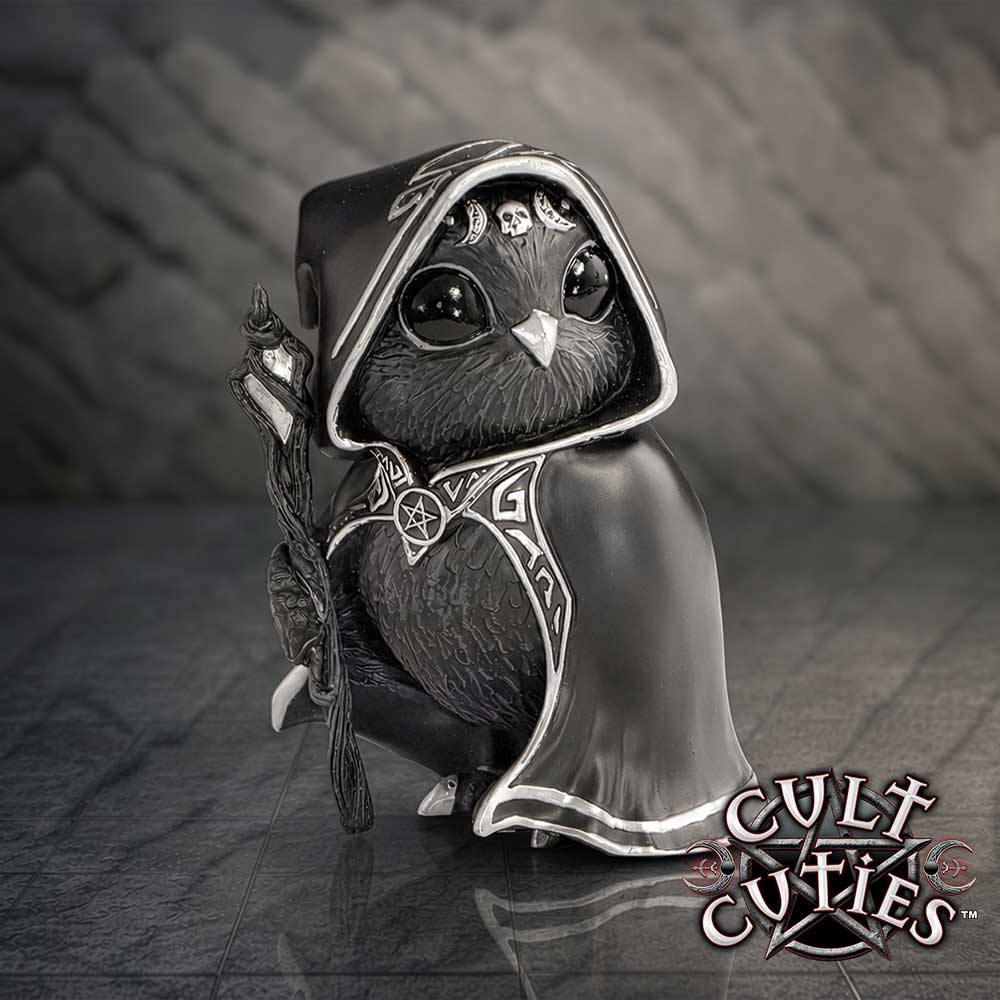 Cult Cuties Featheros Bird Figurine - Featheros displayed against cracked dark background