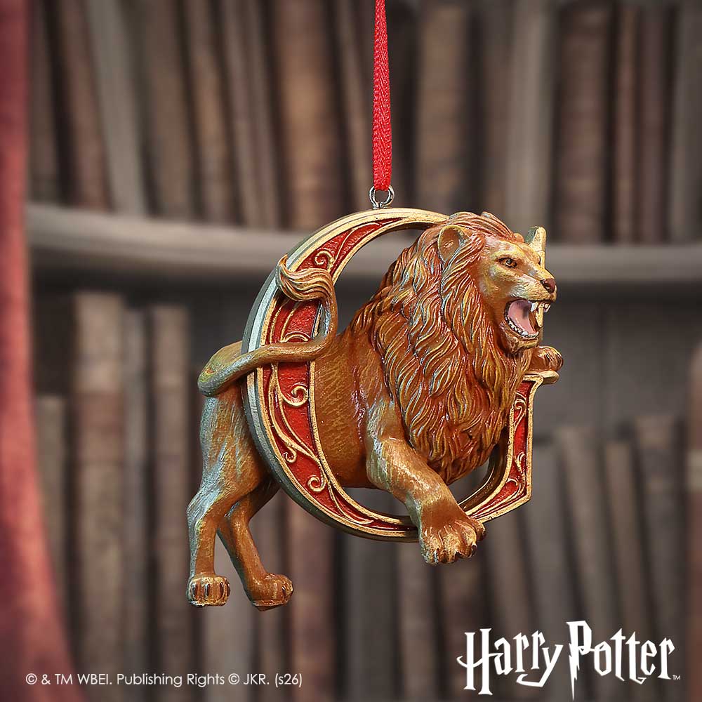 Harry Potter Gryffindor Hanging Ornament - Red-ribbon lion ornament hanging before bookshelves