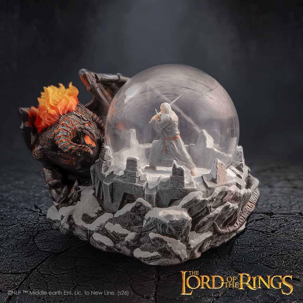 Lord of the Rings Battle of the Peak Snow Globe - Snowy Gandalf and Balrog scene on a dark display surface