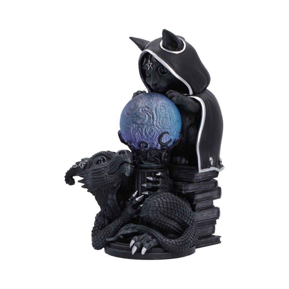 Cult Cuties Mystic Mischief Figurine - Angled view of decorative sphere and stacked spell books