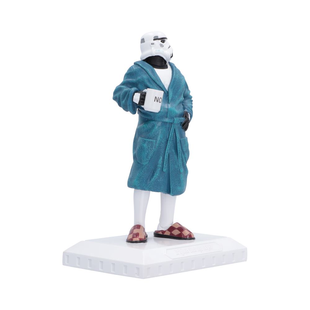 Stormtrooper Off Duty Figurine - Side view of mug beside belted blue robe